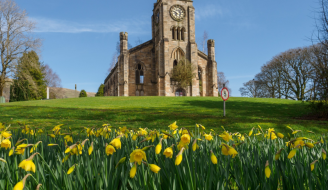 Campsie High Kirk with flowers in foreground