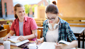 Teenager Studying in Cafe 