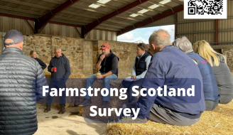 Farmers having discussion in a barn