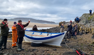 Jeff Mackie Boat Builder Toasting 'Grace' - Image by Strathnaver Museum 