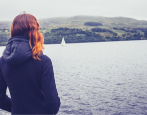Girl looking out into loch