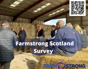 Farmers having discussion in a barn