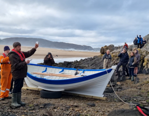 Jeff Mackie Boat Builder Toasting 'Grace' - Image by Strathnaver Museum 