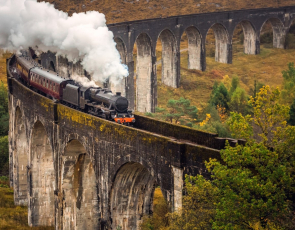Steam train crossing viaduct, Scotland