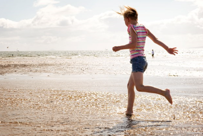 Girl at Saltcoats Beach in Ayrshire copyright Becky Duncan Photography