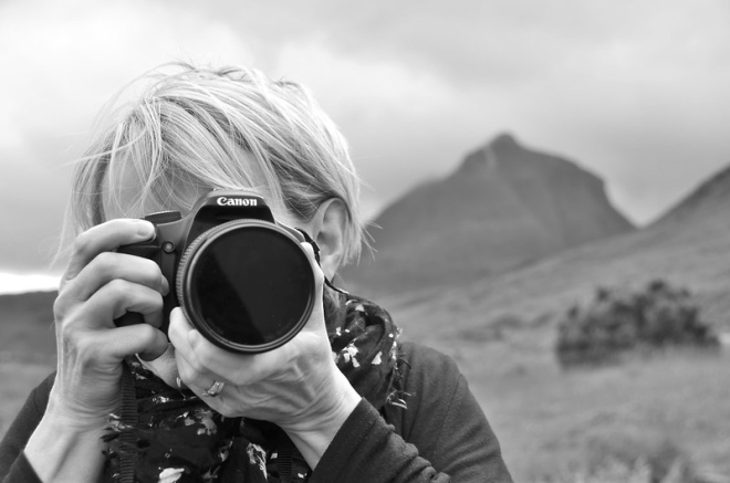 Women using SLR camera