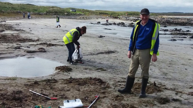 Volunteers litter picking on beach