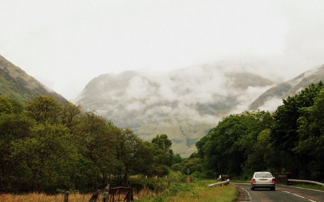 View from passenger seat of car in rural Scotland