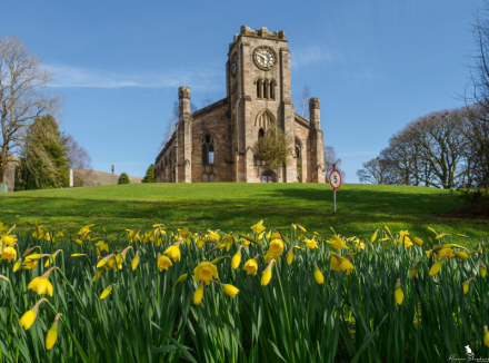 Campsie High Kirk with flowers in foreground