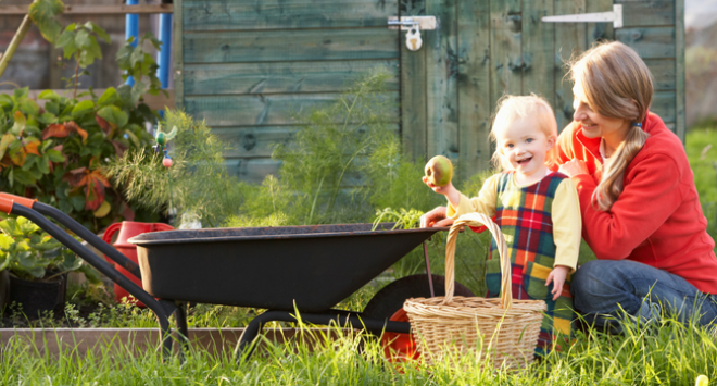 Woman and child working in allotment