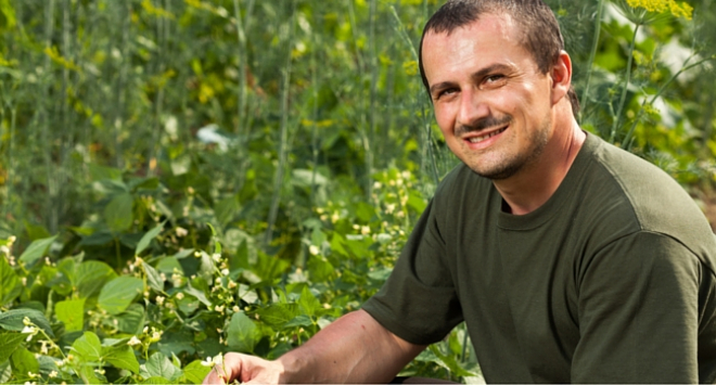 Man beside crops