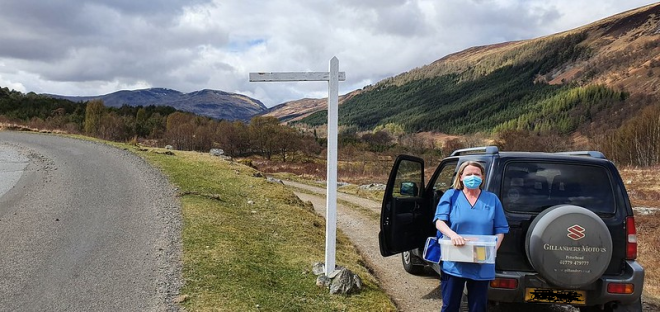 Community nurse on rural road