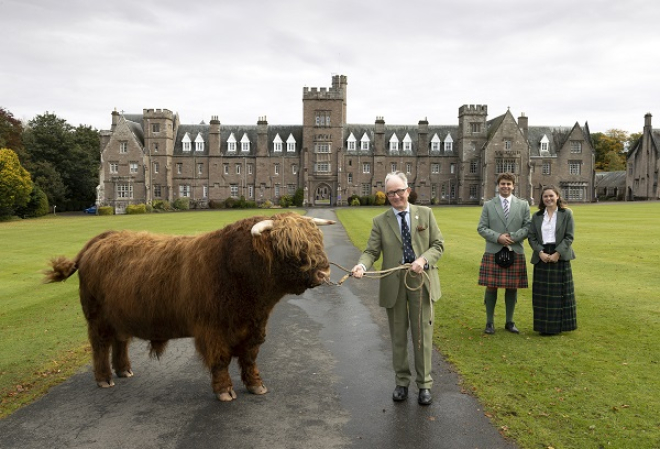 David Leggat, Vice-Chairman of RSABI, Louisa Forysth & Leon Christie, Glenalmond School Captains, and Donald the Highland Bull