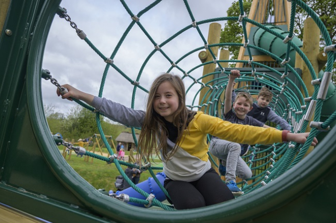 Children playing in play park