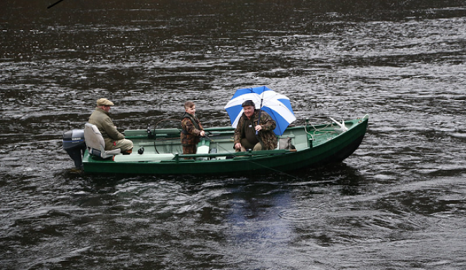 Jimmy Stewart casting the first line to the start the salmon fishing season. Photo By Scottish Government (Flickr)