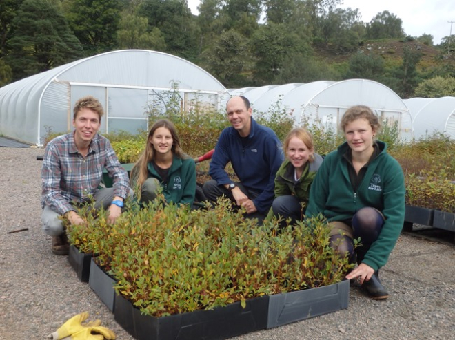 Group of people at plant nursery