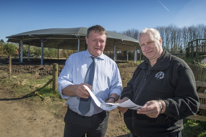 : Des Martin (West Lothian LEADER Local Action Group Chair and Learning Resource Manager, SRUC, Oatridge Campus) and Dr Robin Chesters (Director, Almond Valley Heritage Trust) check the canopy of the new Oil Shale Discovery Space.