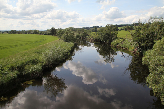 river, with fields and tress