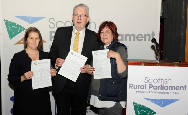 From left to right Emma Cooper, Michael Russell MSP- Cabinet Secretary for Government Business and Constitutional Relations, Amanda Burgauer