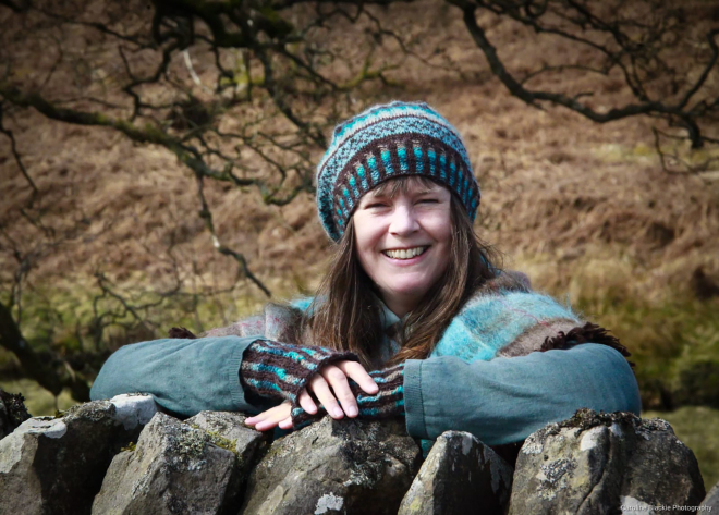 Woman in knitted jumper and hat