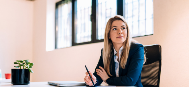 Business woman sitting at table