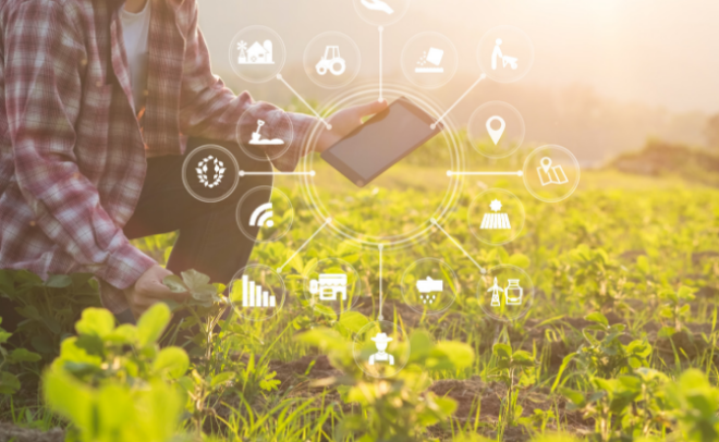 Farmer with technology surrounding them