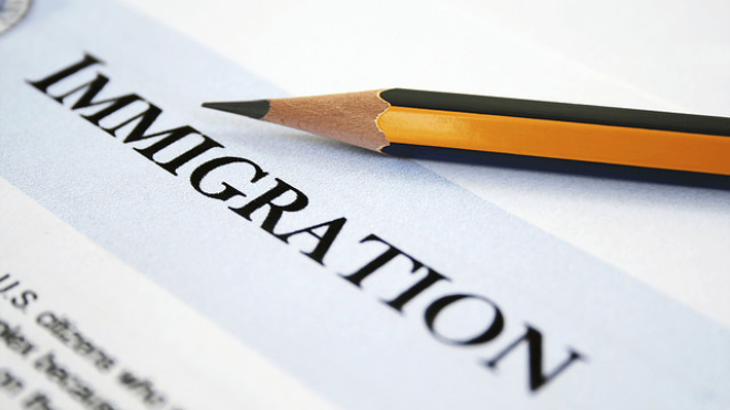 pencil with word 'immigration'