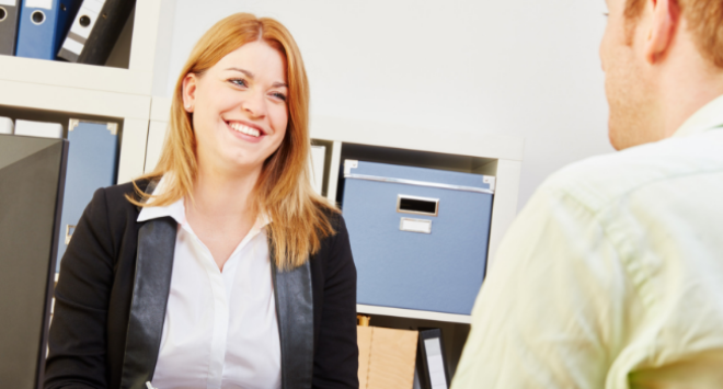 Woman interviewing man