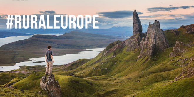 Man standing on hill in Skye, with #RuralEurope text, photo courtesy of Joshua Earle on Unsplash