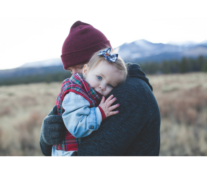 Man with baby. Photo credit: Josh Willink from Pexels