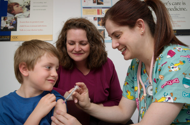 Nurse with mother and child