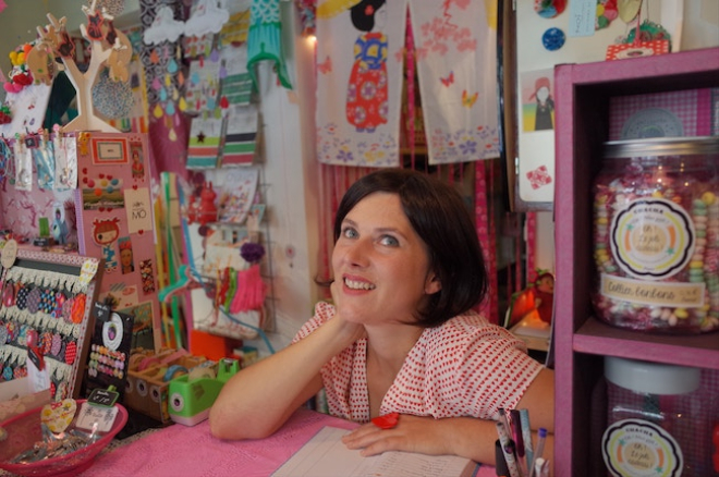 Woman at desk of shop, Photo by Remy Baudouin on Unsplash