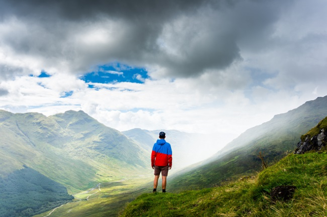 Person standing on hill