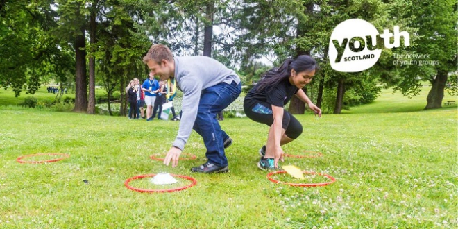 young people playing game with Youth Scotland graphic