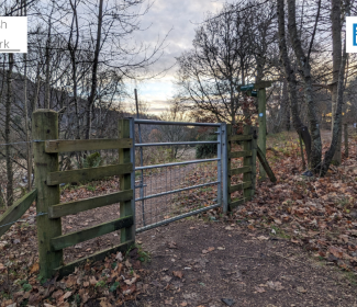 Gate leading to country path  